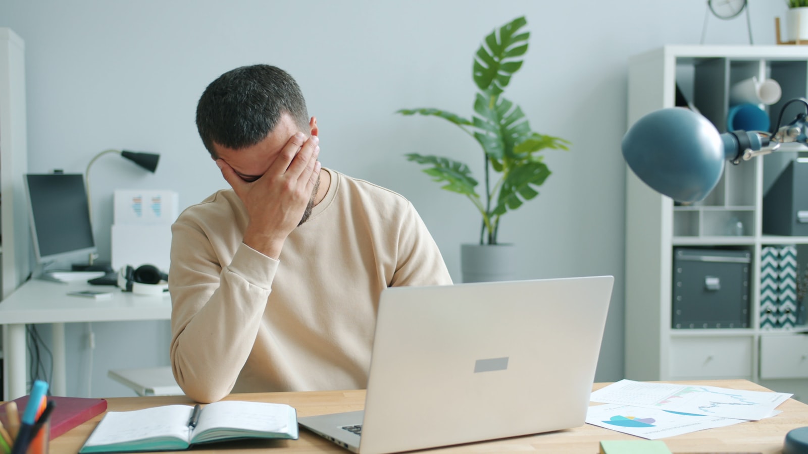 Business owner overwhelmed by budget planning stress
