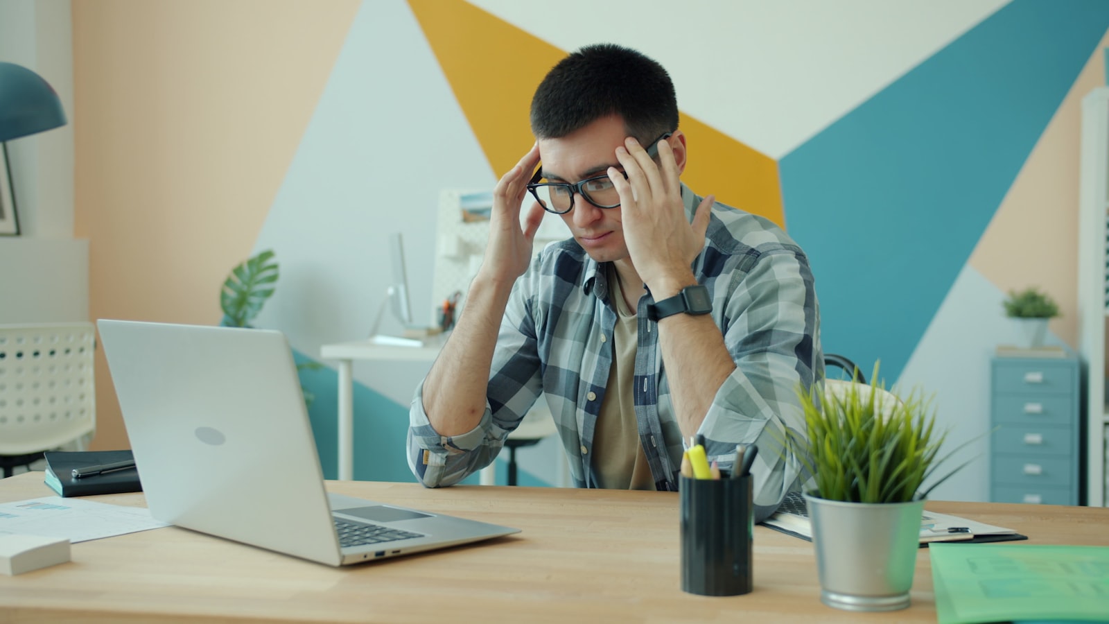 Business owner overwhelmed by payroll calculations